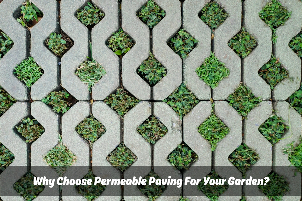A close-up photo of grey concrete grid pavers with a lawn growing in between the gaps. Text in the top right corner reads "Why Choose Permeable Paving For Your Garden?