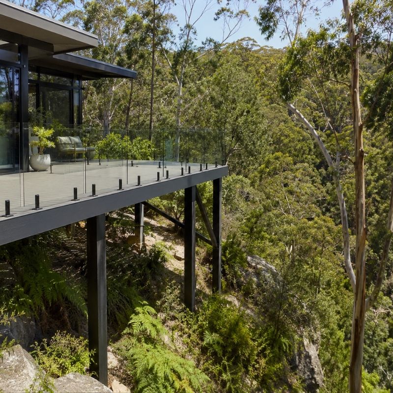 Composite deck reaching over a steep bushland slope in the Sutherland Shire